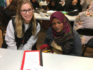 A Sage student and English language students at the Refugee Welcome Center in Albany.
