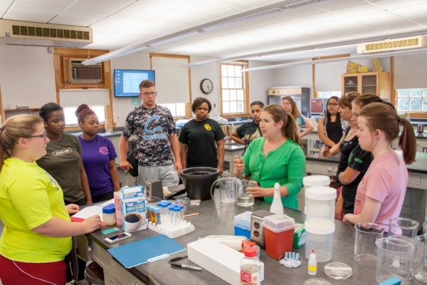 Dr. LaMonica with group of students