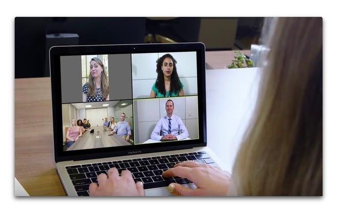 laptop screen showing multiple video chat participants