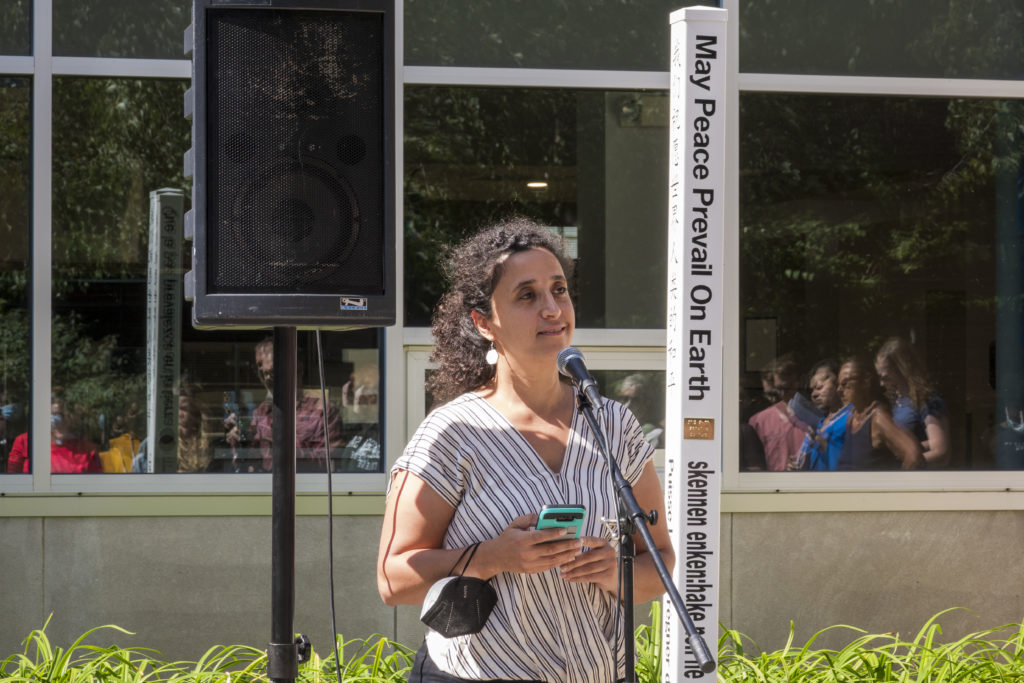 Diya Abdo at Peace Pole on Russell Sage College Troy campus