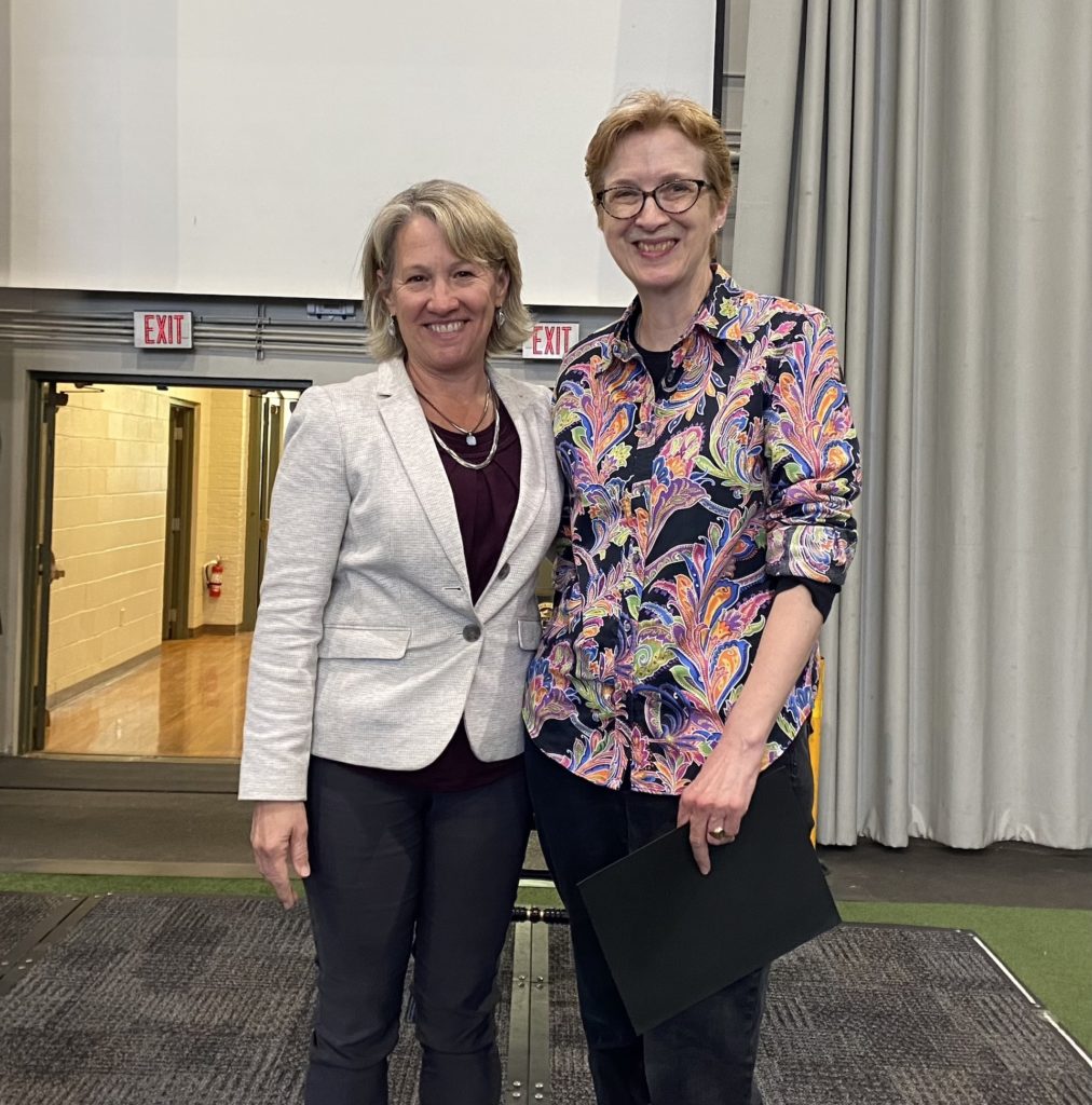 Lynne Roblin, costume designer, who is retiring after 11 years, with Provost Theresa Hand.