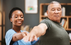 physical therapist working with a patient